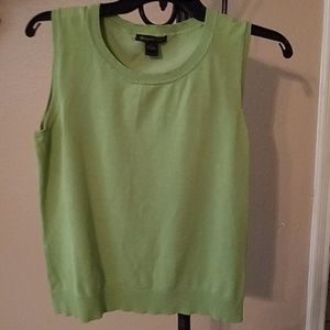 Sleeveless green sweater